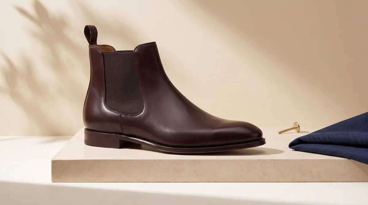 Chelsea Boot footwear in a refined studio setting